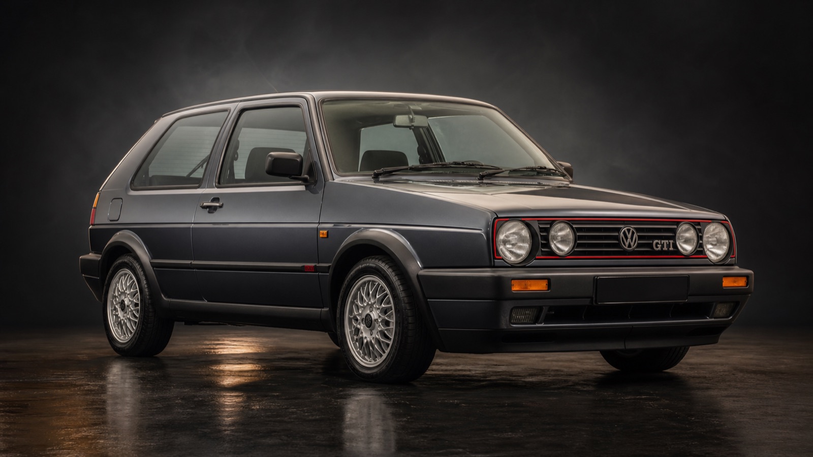 Dark Metallic Grey VW Golf GTI in a dark photographic studio