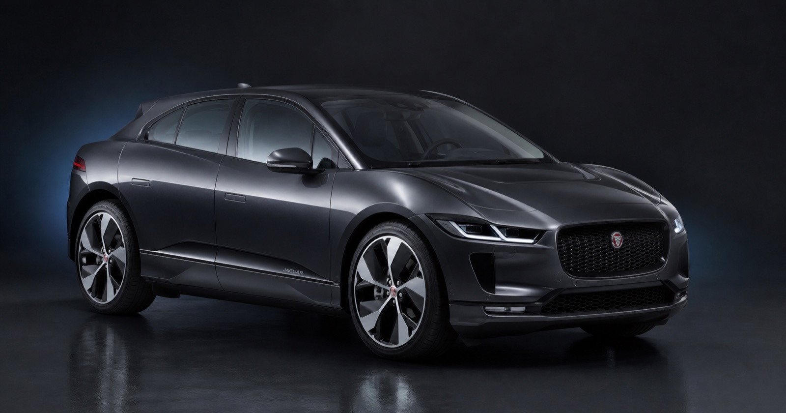 Black or dark grey Jaguar I-Pace (1 of 5) in a dark photographic studio